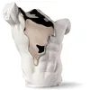 Image de LLADRÓ Fluidité éternelle. Figurine décorative d'un torse masculin de style classique. Sculpture en porcelaine blanche mate décorée en lustre argenté qui coule sur la pièce et symbolise la dualité.
