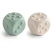 Image de Jouet à Presser en Forme de dé Mushie | Jouet sensoriel Push & Pop | Développement de la motricité Fine | Apprentissage de l’arithmétique Simple | 100% Silicone | (Cambridge Blue/Shifting Sand)