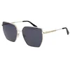 Image de Gant Lunettes de soleil en métal doré